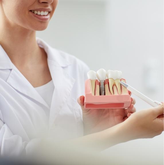 team member reviewing patient smile on computer